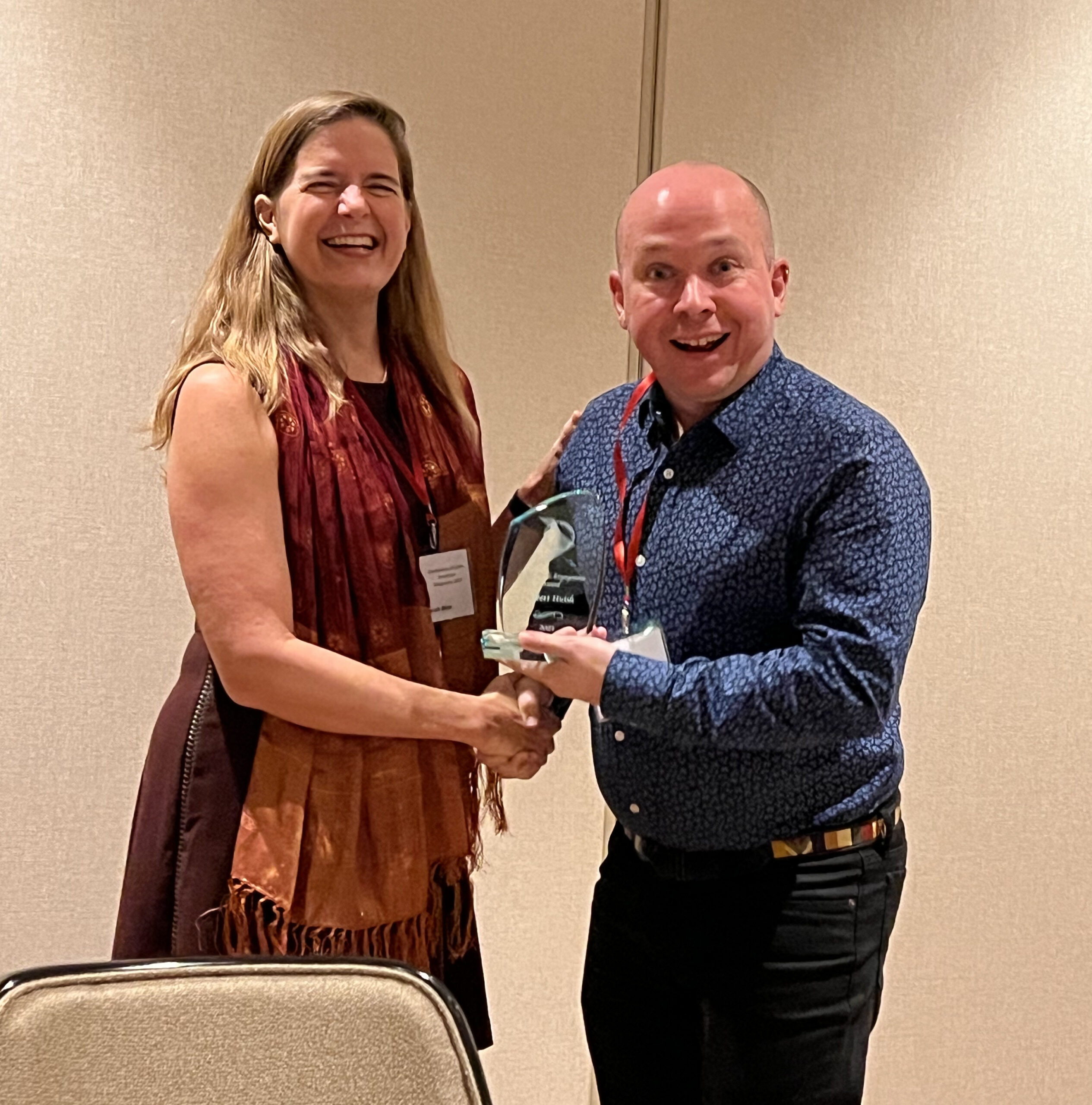 Dr. Robert Huish, Associate Professor of Geography at Ohio University (right) receives the CLAG Teaching Award from CLAG Vice-chair Sarah Blue.